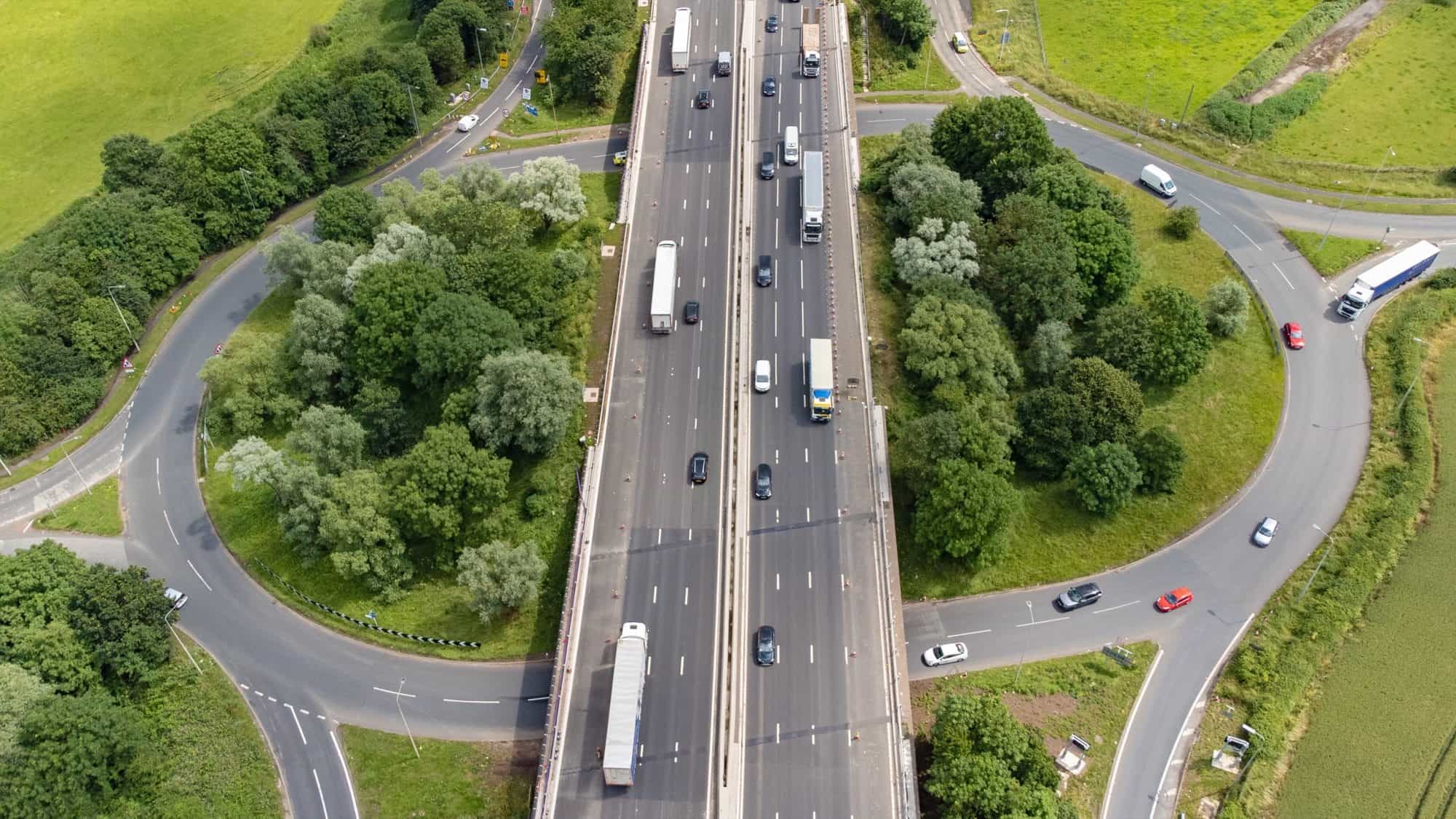 Aerial view of a UK motorway junction and roundabout Aerial view of a UK motorway junction and roundabout