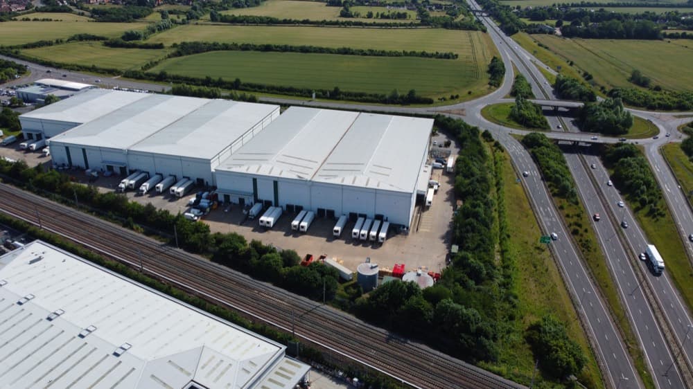 Aerial view of UK commercial estate with multiple business locations Aerial view of UK commercial estate with multiple business locations